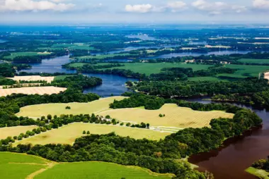 An aerial view of agricultural lands and Skipton Creek as it flows into the Wye River in Talbot County, Maryland.