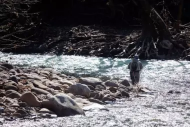 A man fly fishes at Seneca Creek in Pendleton County, West Virginia, at the site of a restoration project completed by Trout Unlimited.